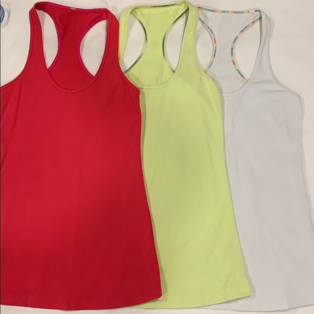 THREE lululemon tanks